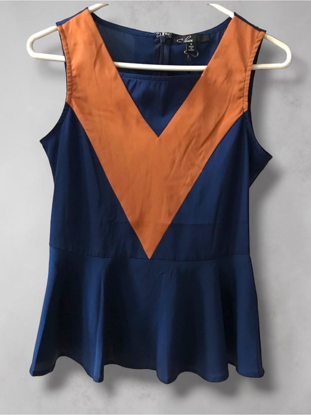 ModCloth Navy and Rust V-Neck Peplum Top